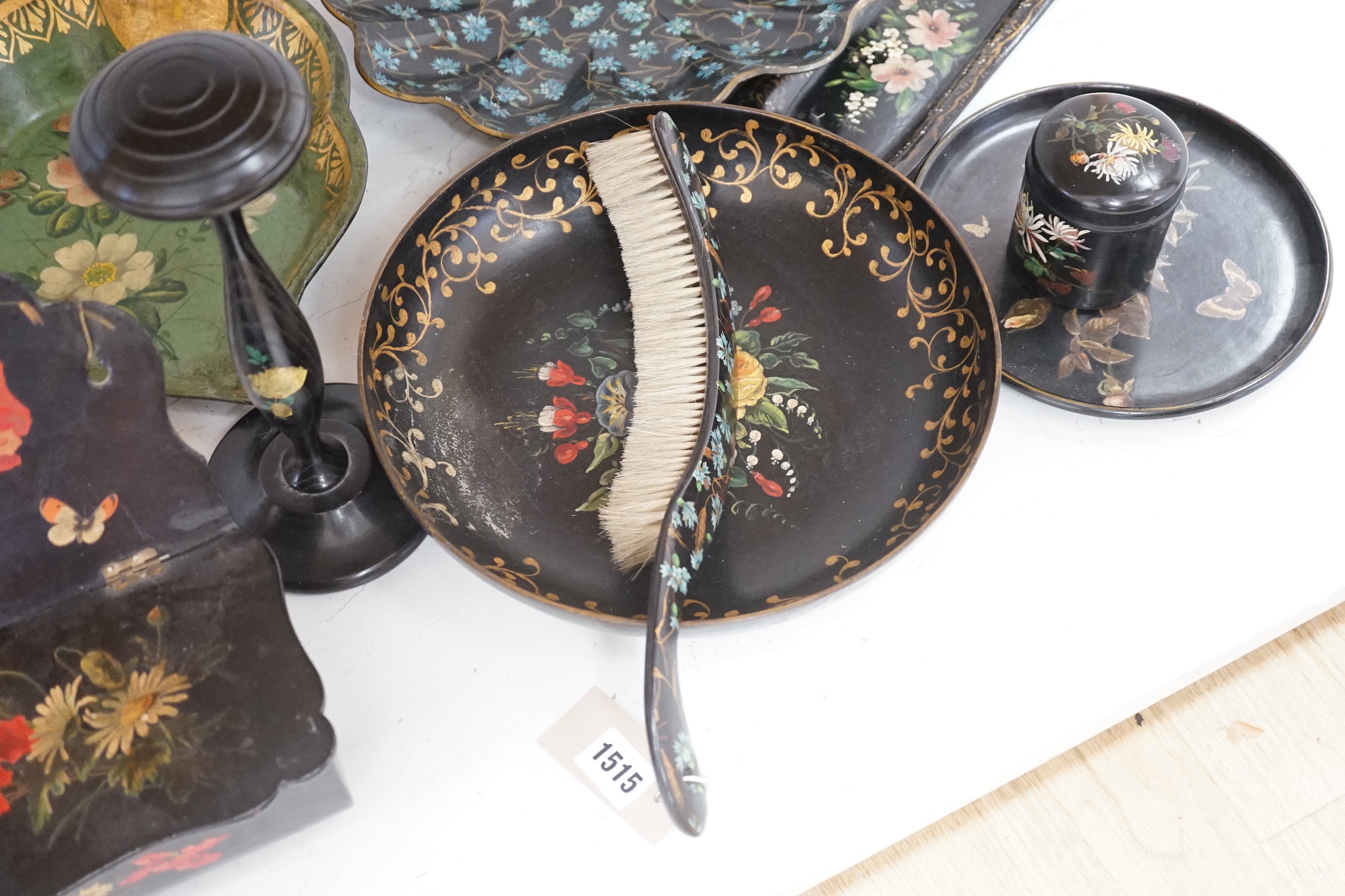 A Victorian papier mache candle box, two crumb scoops and four other items